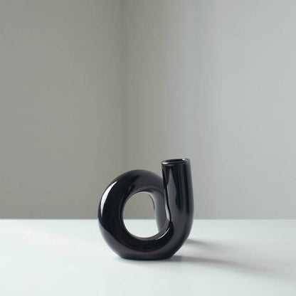 Curvala | Skulpturel Glasvase i Bøjet Design